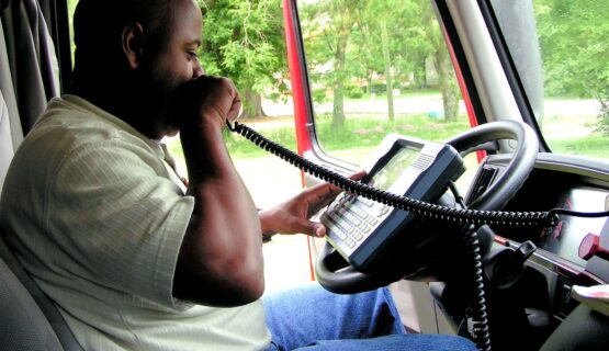 bigstock-African-American-Truck-Driver--705987-min